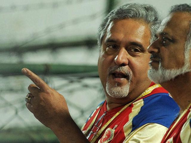 Royal Challengers Bangalore team owner Vijay Mallaya gestures during the IPL 5 cricket match in Jaipur. AFP Photo/Manan Vatsyayana