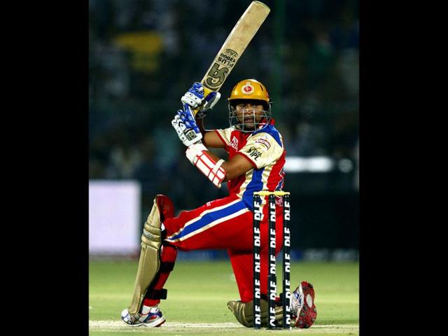 Royal Challegers Bangalore player T Dilshan plays a shot during the IPL5 cricket match against Rajasthan Royals at the Sawai Mansingh Stadium in Jaipur. HT PhotoSanjeev Verma