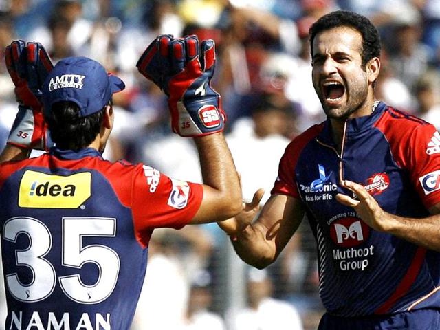 Delhi Daredevils' Irfan Pathan celebrates with wicketkeeper Naman Ojha the wicket of Pune Warriors' batsman Jesse Ryder during the IPL 5 match in Pune. (PTI PhotoShashank Parade)