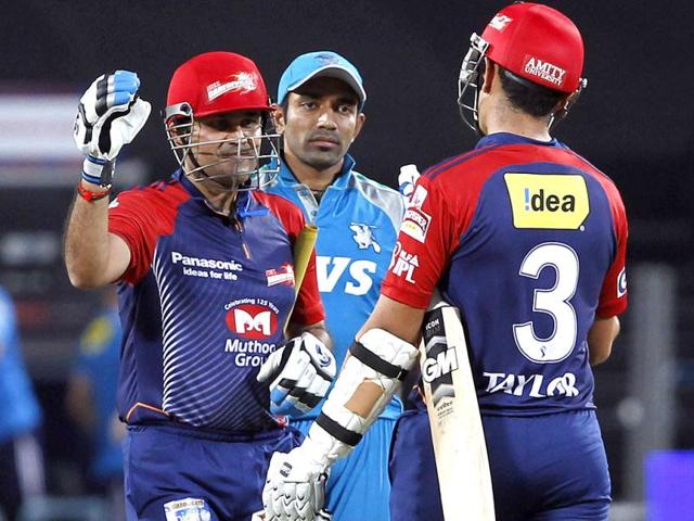 Delhi Daredavils batsman Sehwag celebrates their win with Taylor during the match between Pune Warriors and Delhi Daredavils at Subrata Roy Sahara Stadium in Pune. (HT PhotoSantosh Harhare)