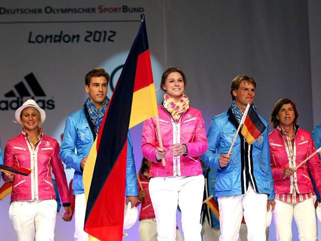 German fencing champion Britta Heidemann (C) and athletes present the official uniforms of the German Olympic team for the 2012 Olympic Games in Duesseldorf. (Reuters/Ina Fassbender)