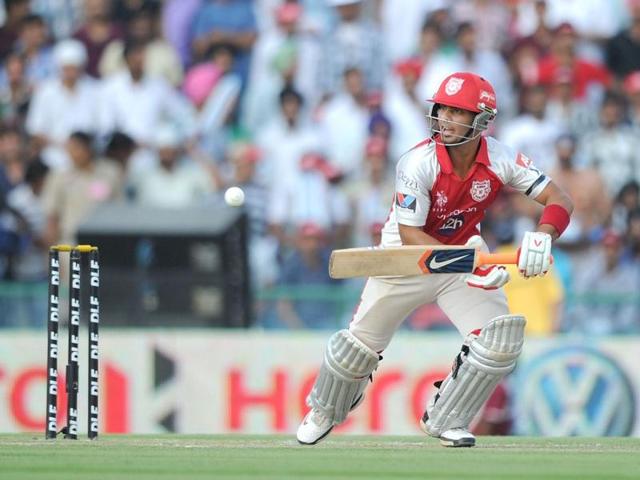 Kings XI Punjab batsman Mandeep Singh plays a shot during the IPL Twenty20 cricket match between Kings XI Punjab and Mumbai Indians at PCA Stadium in Mohali. AFP Photo/Prakash Singh