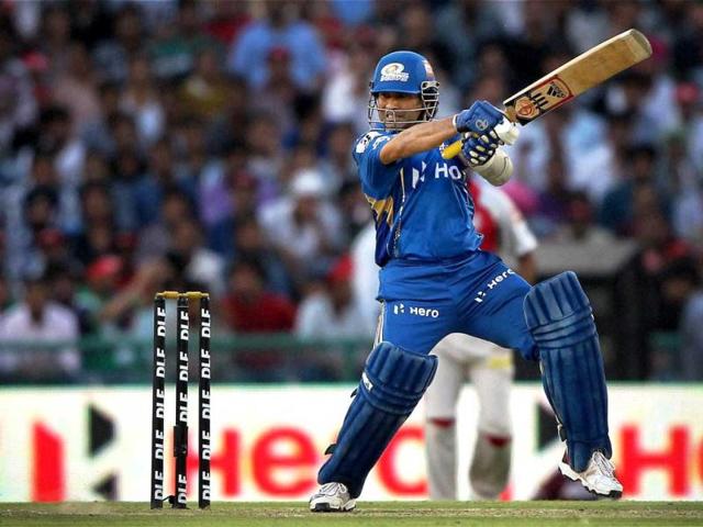 Mumbai Indians' Sachin Tendulkar plays a shot against Kings XI Punjab during their IPL-5 match in Mohali. PTI Photo/Aman Sharma