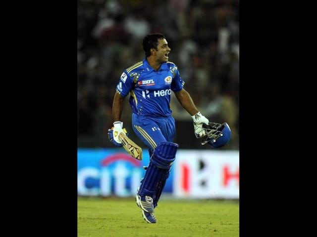 Mumbai Indians batsman Ambati Rayudu celebrates his team's victory during the IPL Twenty20 cricket match between Kings XI Punjab and Mumbai Indians at PCA Stadium in Mohali. AFP Photo/Prakash Singh