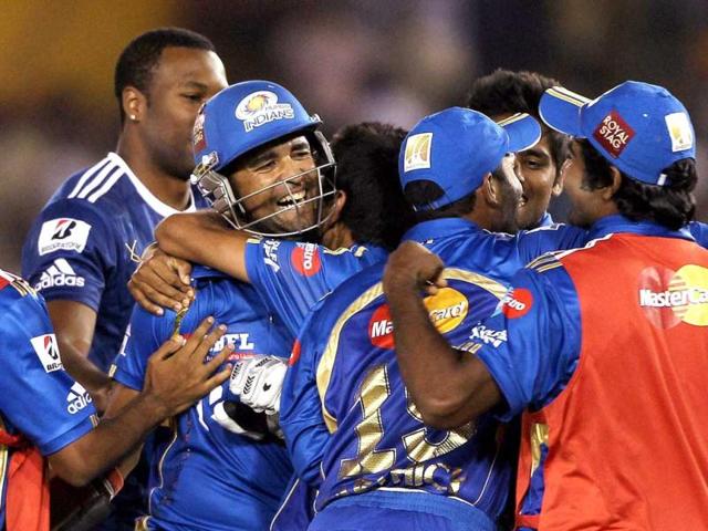Mumbai Indians players celebrate after beating Kings XI Punjab during their IPL-5 match in Mohali. PTI Photo/Aman Sharma