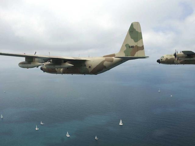 Hercules C-130 Israeli military transport planes fly off the coast of Haifa, in northern Israel, during a military display to mark the 64th anniversary of Israel's Independence. Israelis are marking Independence Day, celebrating the 64th year since the founding of the Jewish State in 1948 according to the Jewish calendar. AFP/David Buimovitch