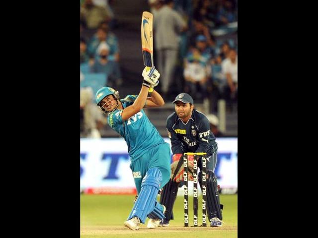 Pune Warriors India batsman Manish Pandey plays a shot during the IPL Twenty20 cricket match against Deccan Chargers at the Sahara Stadium in Pune. AFP Photo/Punit Paranjpe