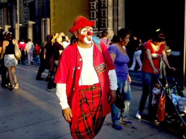 Clown Chicolin walks in downtown Mexico City. (AP Photo/Dieu Nalio Chery)