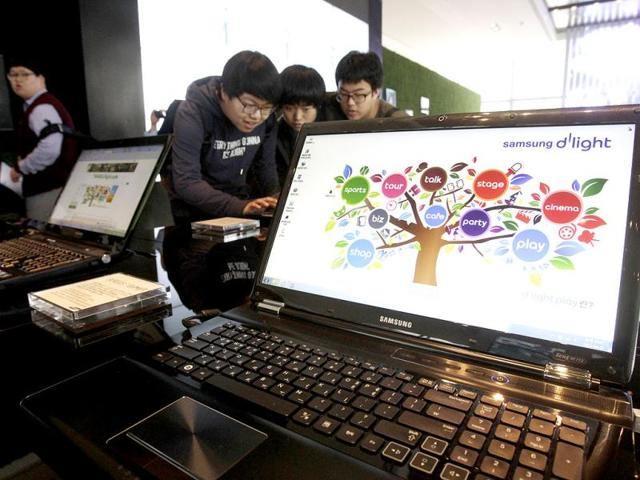 Samsung Electronics' notebook computers are displayed at its showroom in Seoul, South Korea. (AP Photo/Ahn Young-joon)