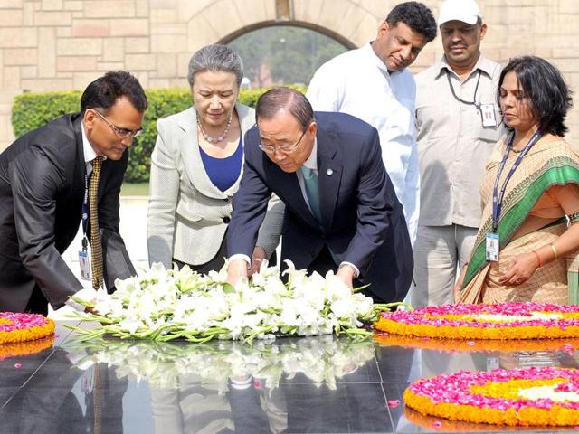 United Nations Secretary General and his wife Yoo Soon-taek lay a wreath at the Mahatma Gandhi Memorial at Rajghat. AFP/Raveendran