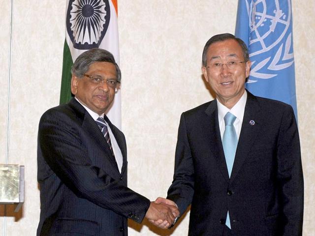 Ban shakes hands with minister for external affairs SM Krishna during a meeting in New Delhi. AFP/Raveendran