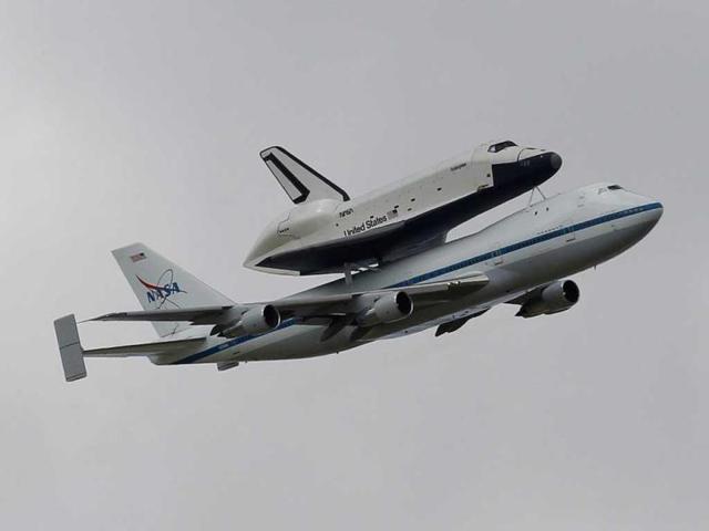 The Space Shuttle Enterprise rides atop a NASA modified 747 plane over New York. The Space Shuttle Enterprise officially arrived in New York to be placed at the Intrepid Sea, Air and Space Museum. REUTERS/Adam Hunger