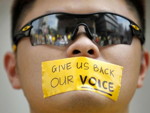 A protester with a message taped over his mouth takes part in the Bersih (Clean) rally near Independence Square in Kuala Lumpur. Reuters/Bazuki Muhammad