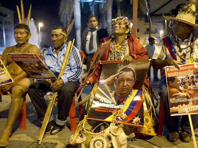 Indigenous people gather for a ritual to pray for the health of Venezuela's President Hugo Chavez in Caracas, Venezuela. AP/Ariana Cubillos
