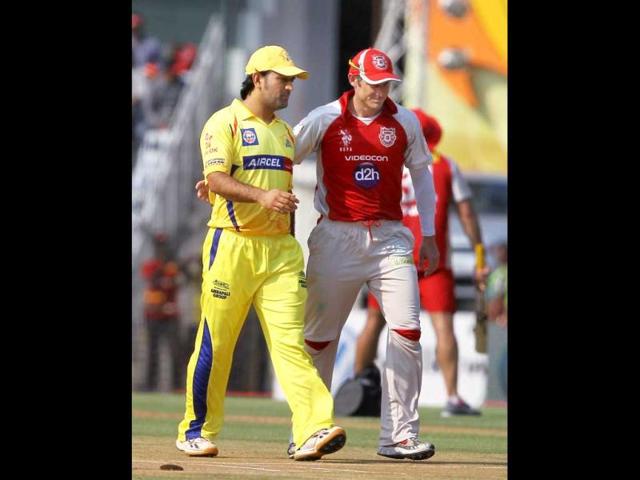 Chennai Super Kings skipper MS Dhoni and Kings XI Punjab skipper David Hussey before their IPL-5 match in Chennai. PTI/R Senthil Kumar