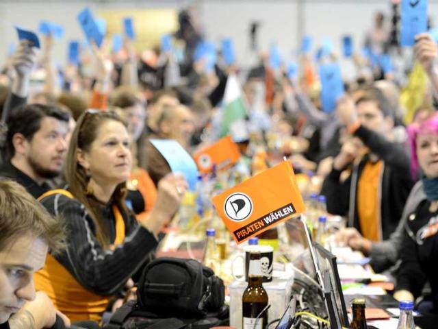 Delegates of Germany's Pirate Party (Piraten Partei) vote at their party convention in Neumuenster. Reuters/Fabian Bimmer