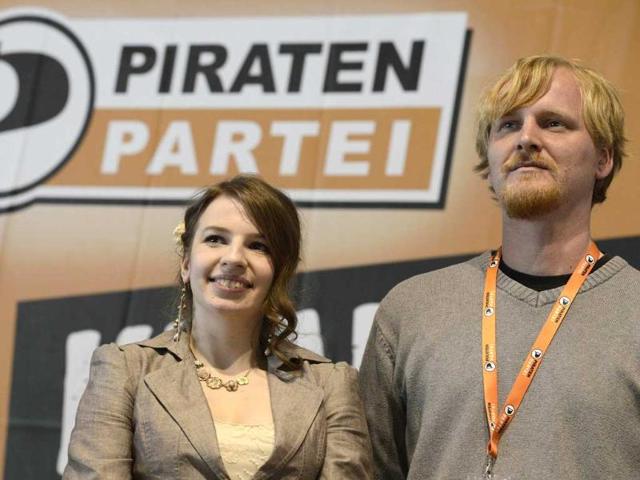 Marina Weisband (L), political secretary of Germany's Pirate Party (Piraten Partei), and secretary general Wilm Schumacher listen to a speech at their party convention in Neumuenster April 28, 2012. Reuters/Fabian Bimmer
