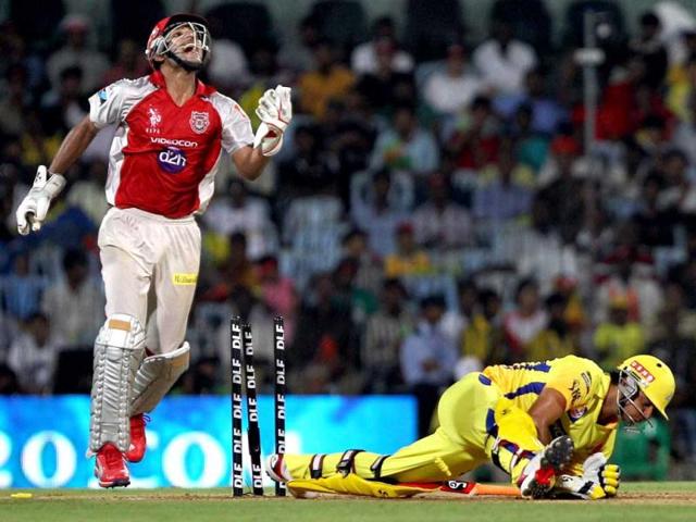 Chennai Super Kings' Suresh Raina is stumped by Kings XI Punjab wicket-keeper Nitin Saini during their IPL-5 match at MAC Stadium in Chennai. PTI/R Senthil Kumar
