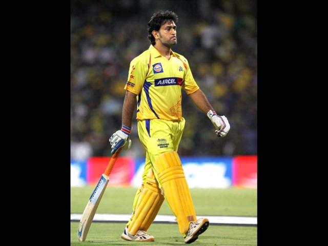 Chennai Super Kings skipper MS Dhoni walks back to pavilion after losing his wicket during the IPL-5 match against Kings XI Punjab at MAC Stadium in Chennai. PTI/R Senthil Kumar