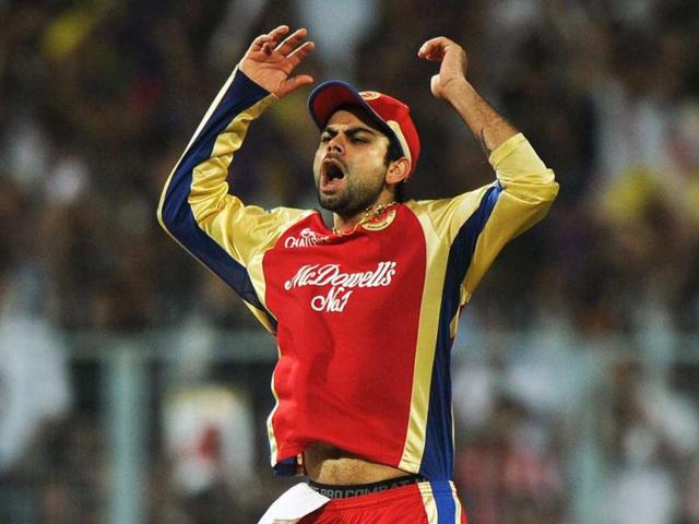 Royal Challengers Bangalore fielder Virat Kohli reacts during the IPL Twenty20 cricket match against Kolkata Knight Riders at the Eden Gardens in Kolkata. AFP/Dibyangshu Sarkar