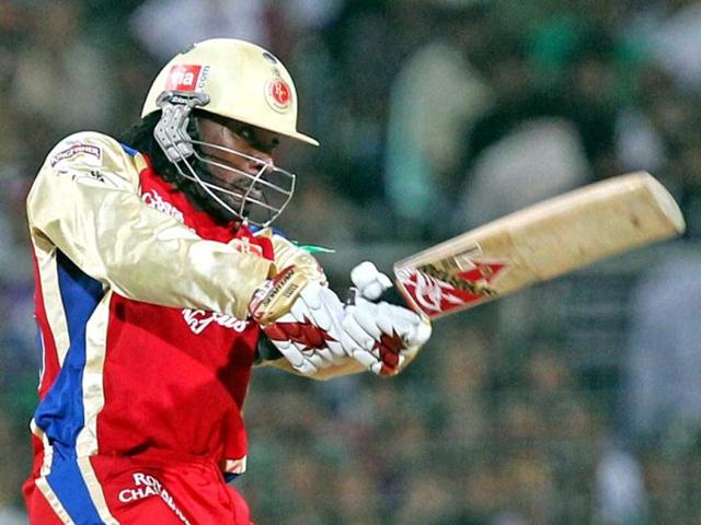 Royal Challengers Bangalore batsman Chris Gayle plays a shot during an IPL-5 match against KKR at Eden Gardens in Kolkata. PTI/Swapan Mahapatra
