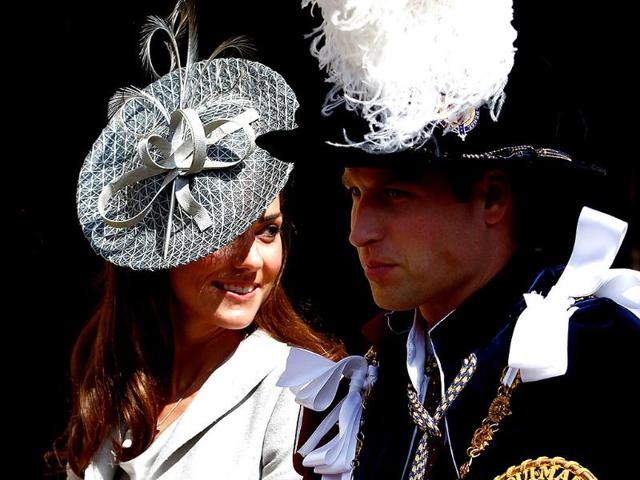 Britain's Catherine, Duchess of Cambridge (L), sits next to her husband Prince William as they leave the Order of the Garter service at St. George's chapel inside the grounds of Windsor Castle, in Windsor, southern England. (Reuters/Andrew Winning)