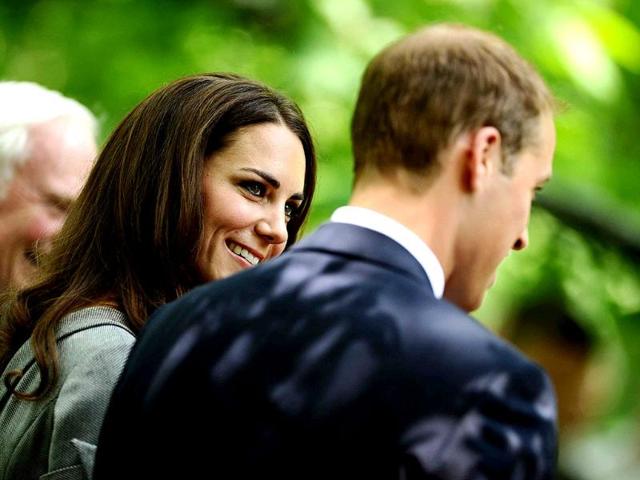 Britain's Prince William (R) and his wife Catherine, Duchess of Cambridge attend a tree planting ceremony at Rideau Hall in Ottawa. (Reuters/Lionel Hahn/POOL)