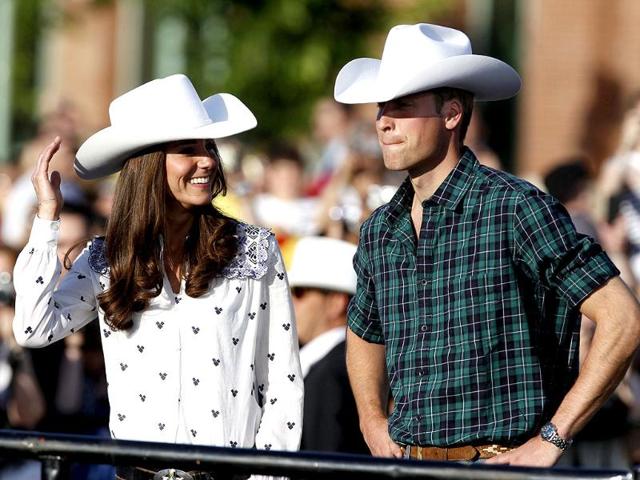 Britain's Prince William and his wife Catherine, Duchess of Cambridge, wear cowboy hats as they arrive for a Canadian government reception in Calgary, Alberta. (Reuters/Phil Noble)