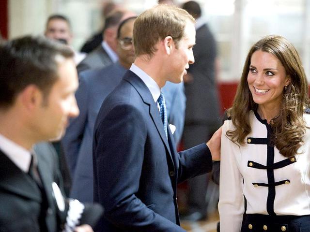 Britain's Prince William and Catherine the Duchess of Cambridge visit the Summerfield Community Centre, in the Winson Green area of Birmingham. (Reuters/Geoff Pugh/Pool)