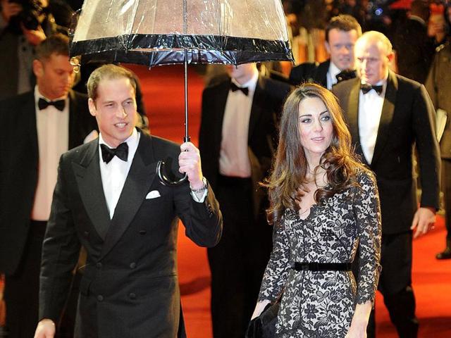 Britain's Prince William (L) arrives with Catherine, Duchess of Cambridge to the UK premiere of the film 'War Horse' in London. (Reuters/Paul Hackett)