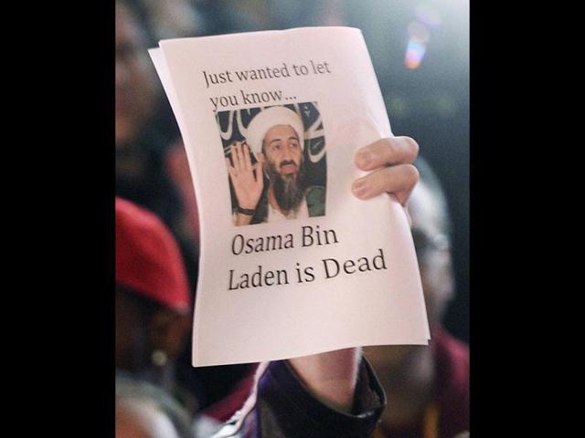 People celebrate after al Qaeda leader Osama bin Laden was killed in Pakistan, during a spontaneous celebration in New York's Times Square, May 2, 2011. (Reuters)