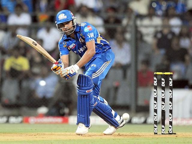Mumbai Indians batsman Rohit Sharma plays a shot during the IPL Twenty20 cricket match against Deccan Chargers at the Wankhede Stadium in Mumbai. AFP/Punit Paranjpe