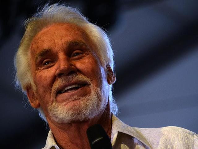 Kenny Rogers performs on stage at the Stagecoach Country Music Festival in Indio, California. AFP Photo/Robyn Beck