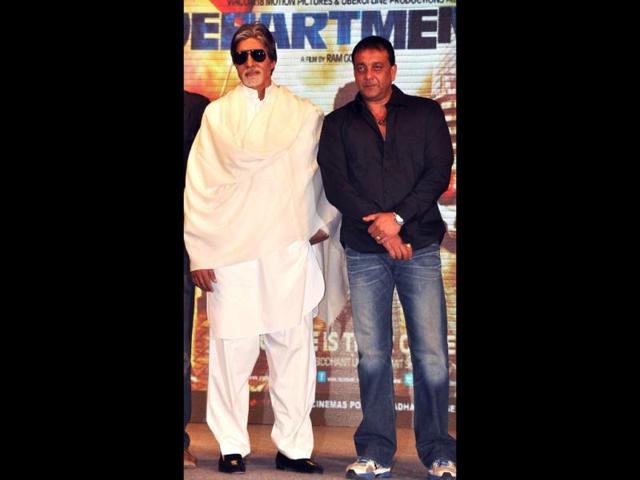 Big B and Baba pose for the shutterbugs.