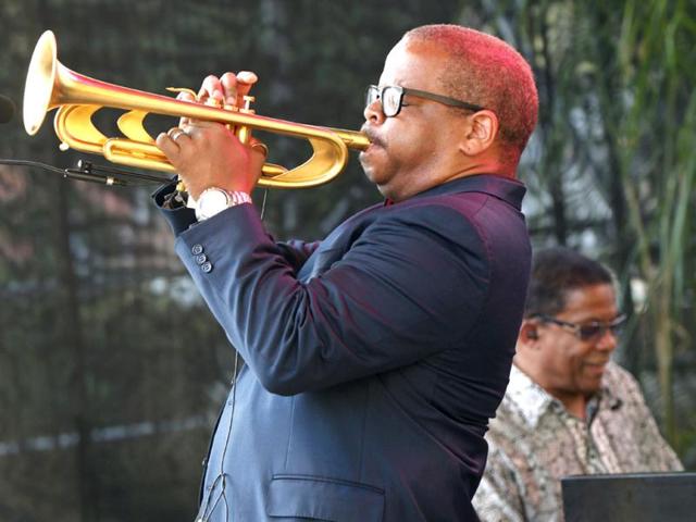 Terrence Blanchard, foreground, and Herbie Hancock perform at a sunrise concert marking International Jazz Day in New Orleans. Thousands of people across the globe are expected to participate in International Jazz Day, including events in Belgium, France, Brazil, Algeria and Russia. AP Photo/Gerald Herbert