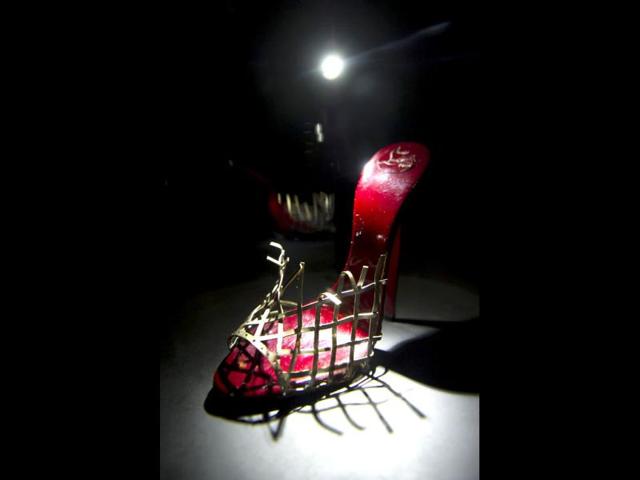 French shoe designer, Christian Louboutin, opens his first ever retrospective exhibition, at the Design Museum, London. The exhibition will be the first comprehensive presentation of Louboutin's work, and will showcase how he has helped transform the design of the shoe over the past 20 years. AP Photo/Jonathan Short