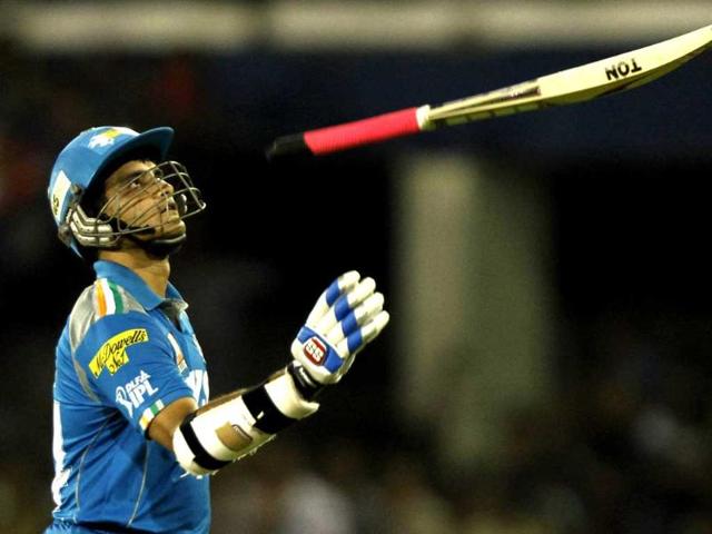 Sourav Ganguly, the captain of Pune Warriors, tosses his bat after being caught out by Cameron White off the bowling of Shikhar Dhawan of Deccan Chargers in their IPL5 match at Barbati Stadium, Cuttack. HT/Subhendu Ghosh