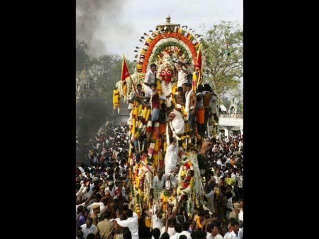 An idol of warrior god Aravan is taken in a chariot during the annual eunuch festival at Koovagam, near Chennai. AP Photo/Arun Sankar.K