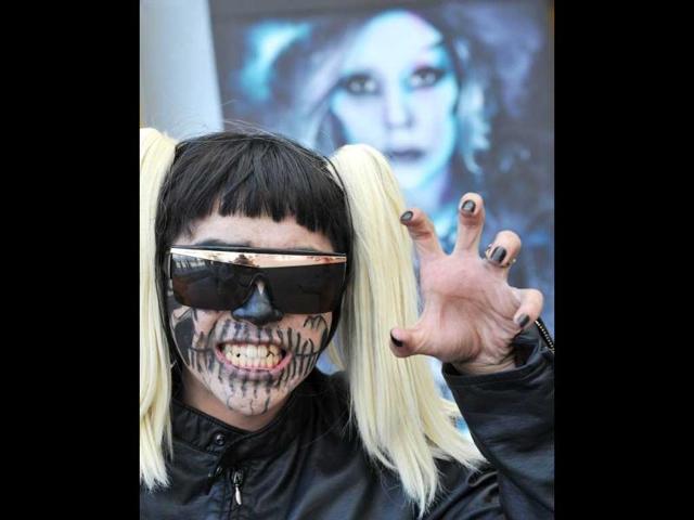 A fan of US pop diva A fan of US pop diva Lady Gaga poses before her concert in Hong Kong. AFP Photo/Laurent Fievet poses before her concert in Hong Kong. AFP Photo/Laurent Fievet