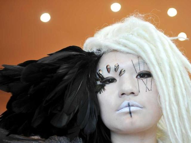 A fan of US pop diva Lady Gaga poses before her concert in Hong Kong. AFP Photo/Laurent Fievet