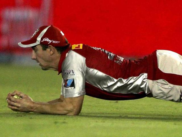 Kings XI Punjab's Shaun Marsh dives to take a successful catch to dismiss Rajasthan Royals' Stuart Binny during their IPL-5 match in Mohali on Saturday. PTI Photo/Aman Sharma