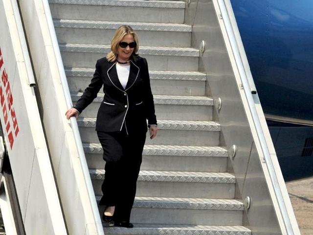 US secretary of state Hillary Clinton alights from her aircraft during her arrival at the Netaji Subhash Chandra Bose International Airport in Kolkata. AFP/Dibyangshu Sarkar