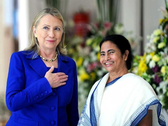 US Secretary of State Hillary Clinton looks on with West Bengal state Chief Minister Mamata Banerjee at the Writers' Building, which houses the state secretariat, in Kolkata. AFP PHOTO/Dibyangshu SARKAR