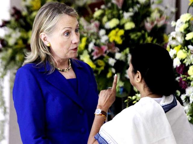 US secretary of state Hillary Rodham Clinton talks to West Bengal chief minister Mamata Banerjee before a meeting in Kolkata. (AP Photo/Bikas Das)
