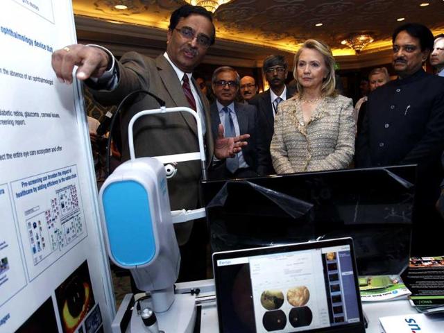 US secretary of state Hillary Clinton and India's minister of science and technology Vilsaro Deshmukh attend the US-India Partnering for Innovative Solutions event in Delhi. REUTERS/Shannon Stapleton