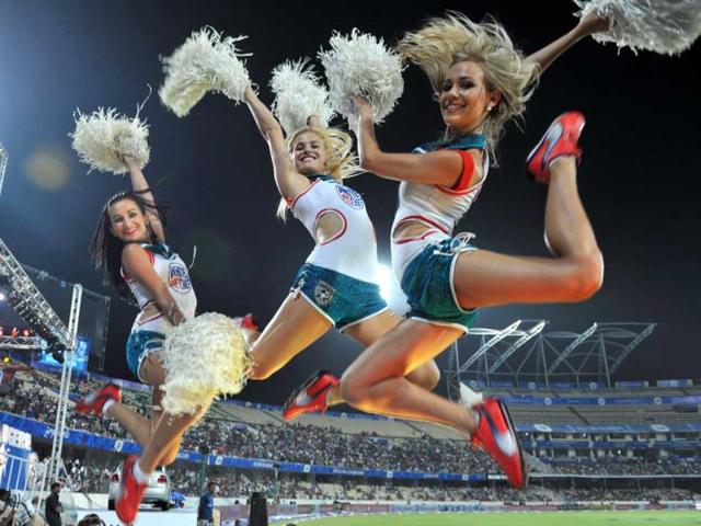 Cheerleaders perform prior to the start of the IPL Twenty20 cricket match between Deccan Chargers and Kings XI Punjab at the Rajiv Gandhi International Stadium in Hyderabad. AFP Photo/Noah Seelam