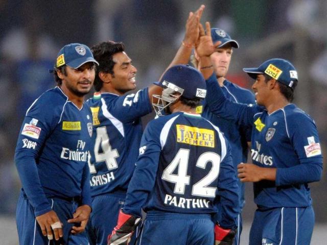 Deccan Chargers cricketers celebrate the dismissal of a batsman of Kings XI Punjab during an IPL 5 match in Hyderabad on Tuesday. PTI Photo