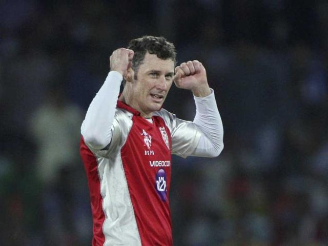 Kings XI Punjab bowler David Hussey, celebrates the wicket of Deccan Chargers Cameron White during their Indian Premier League (IPL) cricket match in Hyderabad. AP Photo/Mahesh Kumar A