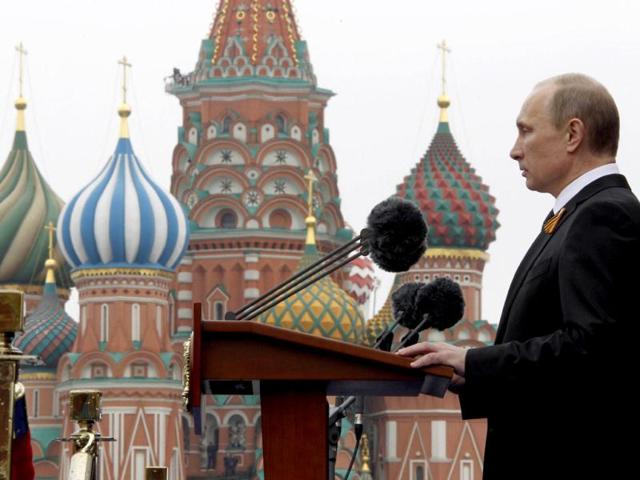 Russia's newly-inaugurated President Vladimir Putin speaks before Victory Day parade at the Red Square in Moscow. Thousands of Russian soldiers marched across Red Square to mark the 67 years since the victory over Nazi Germany in World War II. AFP Photo/ RIA-Novosti