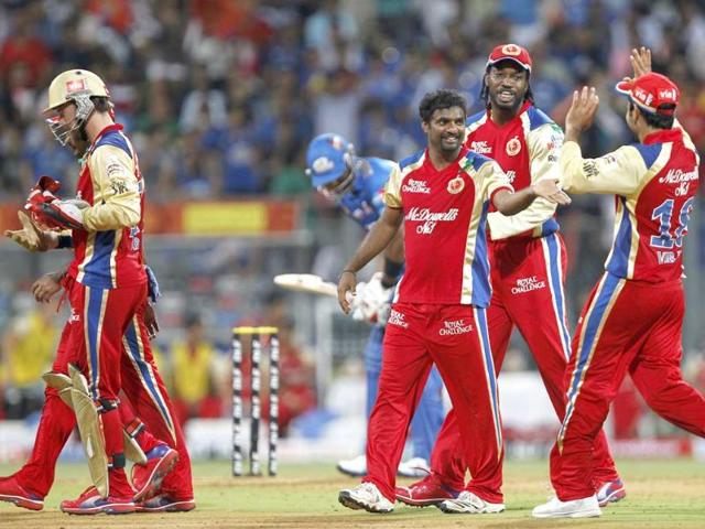 Royal Challengers Bangalore players celebrate the wicket of Mumbai Indians batsman during Indian Premier League cricket match at Wankhede Stadium. HT/Vijayanand Gupta